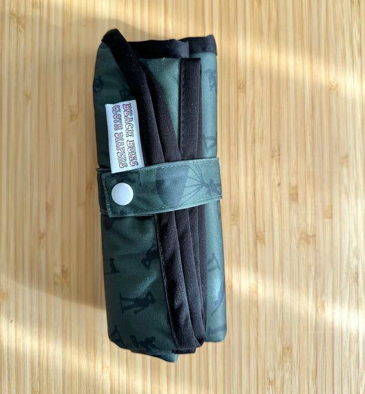 An assortment of colorful cloth diapers neatly stacked, showcasing a sustainable and eco-friendly diapering option for babies. The diapers display various vibrant patterns and soft fabrics, providing a reusable and comfortable solution for families.